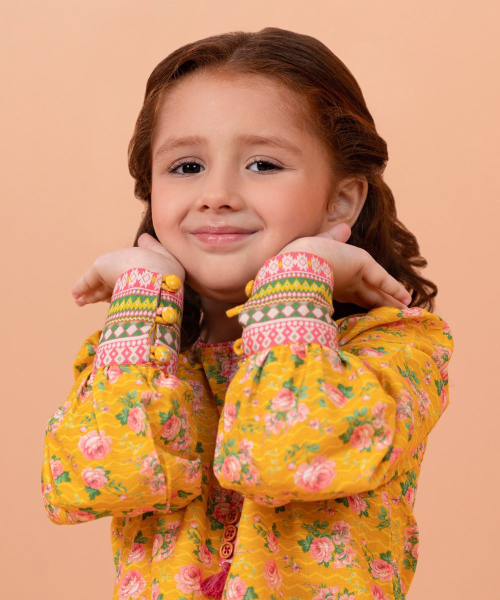 Girls 2 PC Yellow Printed Cotton Khaddar Suit