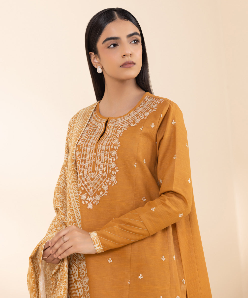 Women's Unstitched Khaddar Embroidered Orange 2 Piece Suit