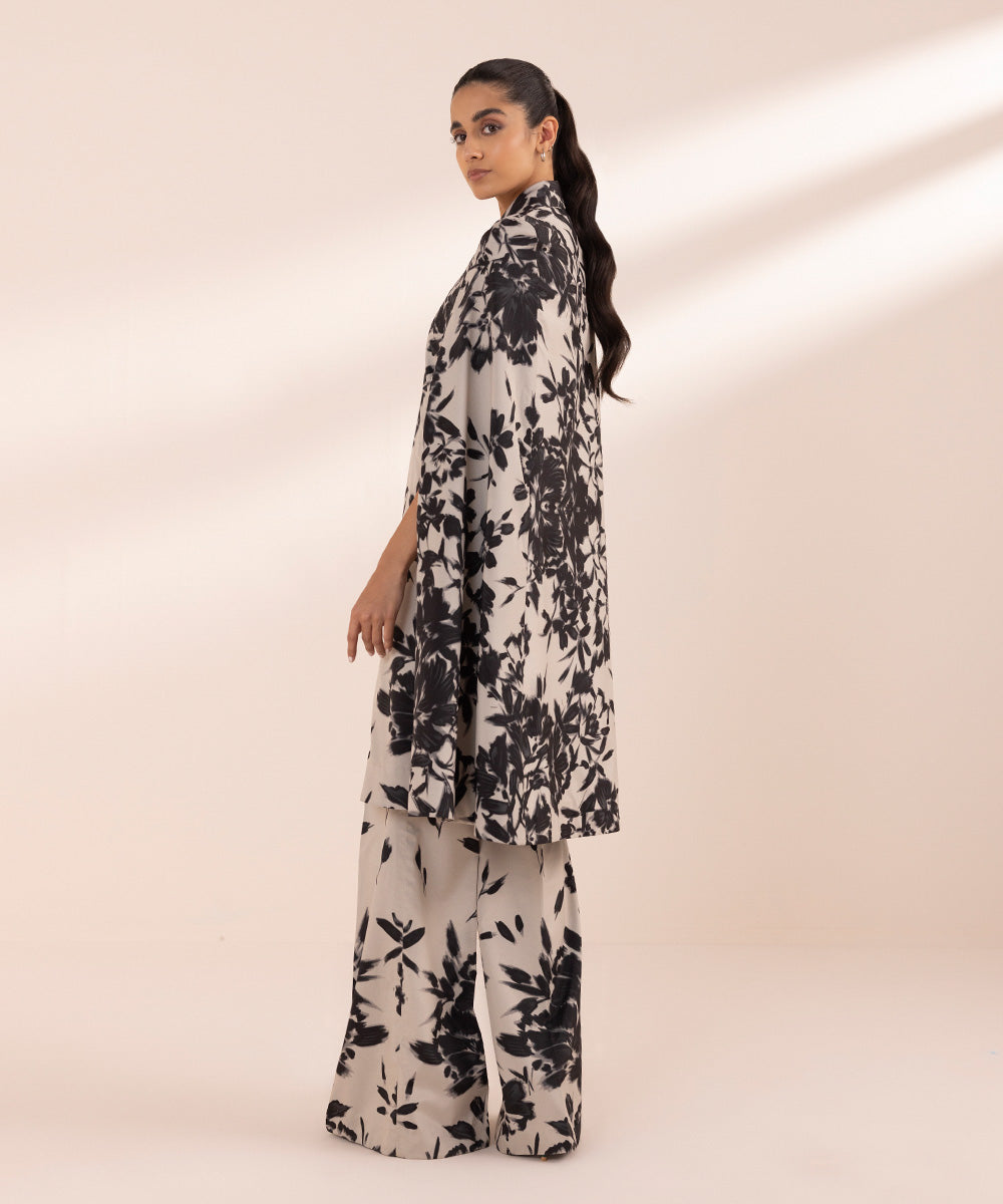 Women's Unstitched Blended Grip Silk Black Printed 2 Piece Suit