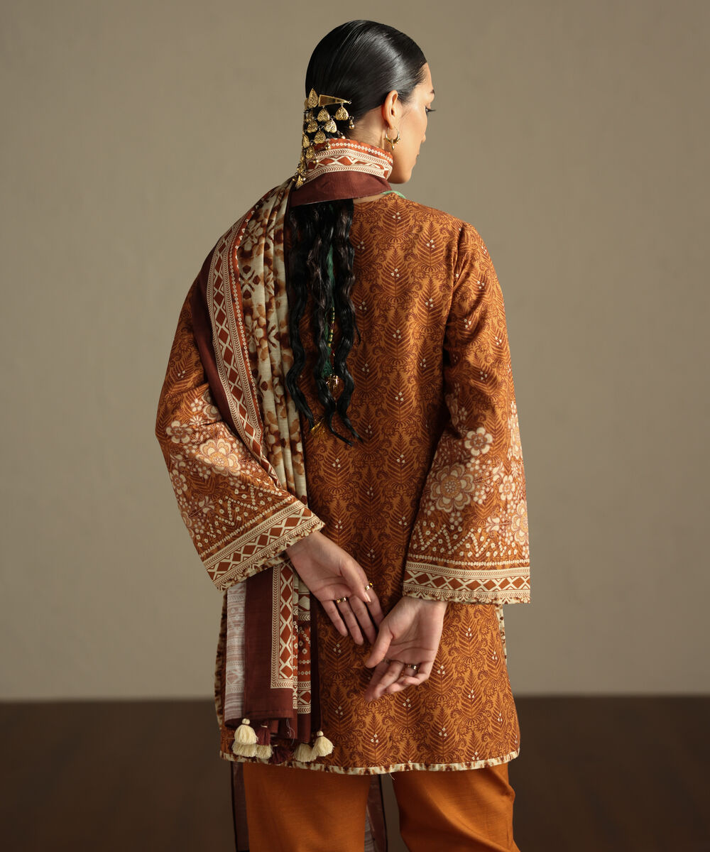 Women's Unstitched Khaddar Printed Orange 3 Piece Suit