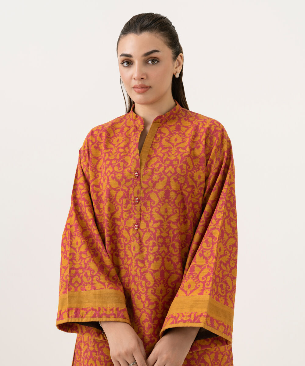 Women's Unstitched Khaddar Printed Orange 2 Piece Suit
