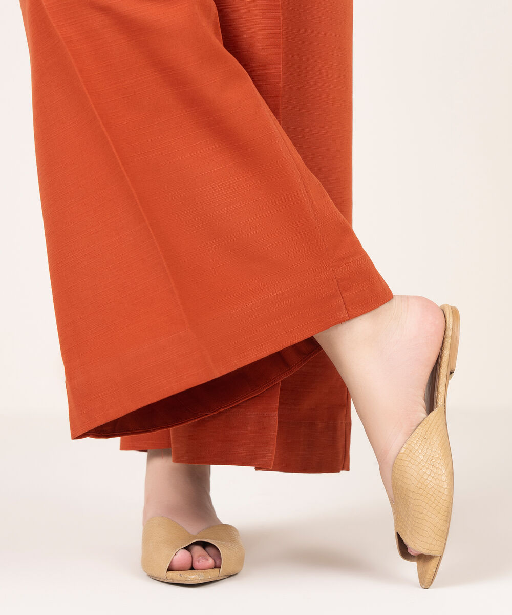 Women's RTW Cotton Solid Rust Flared Pants