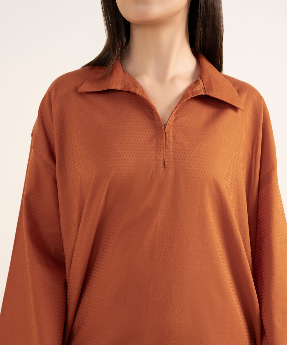 Women's RTW Textured Lawn Orange Solid Drop Shoulder Shirt