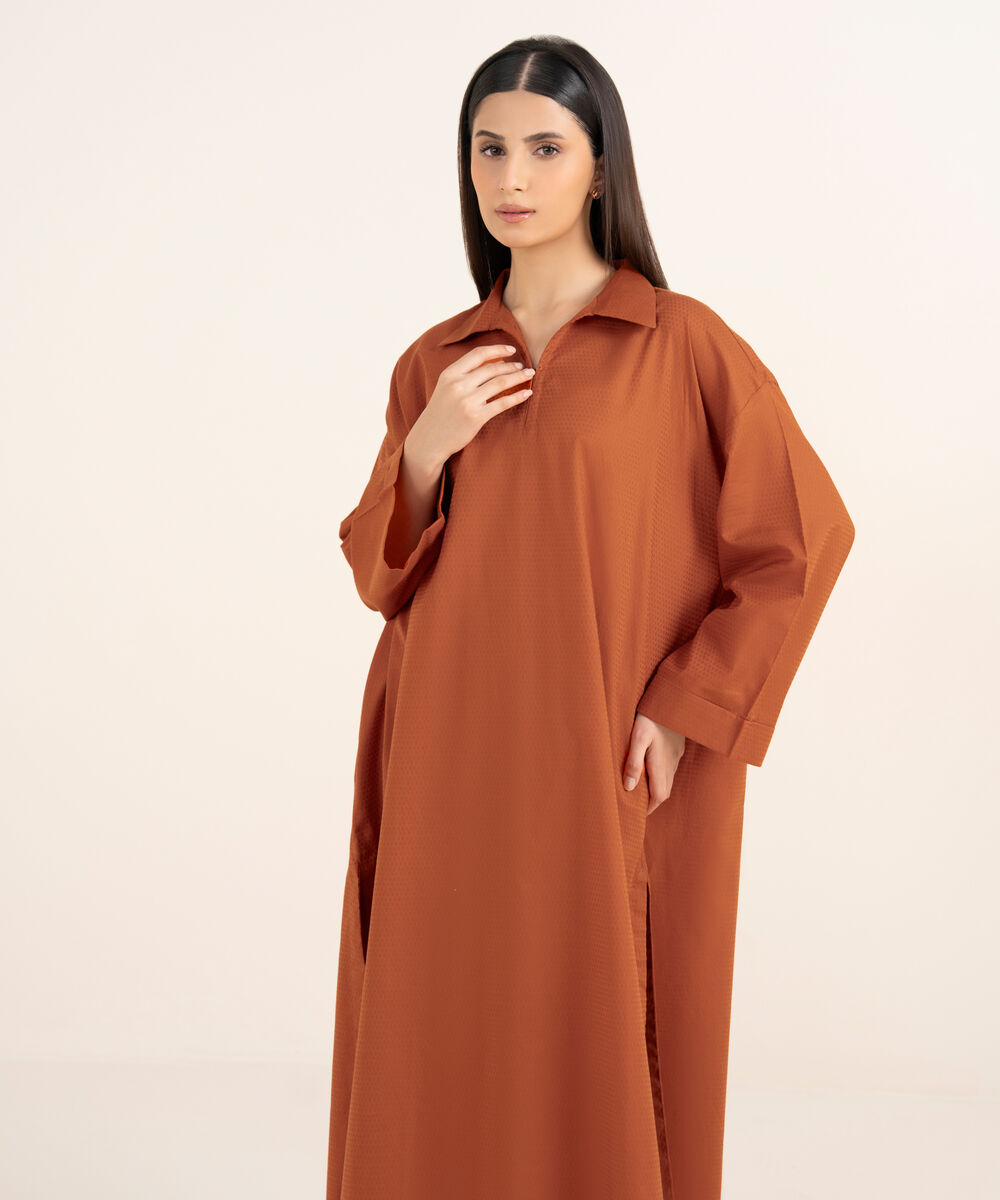 Women's RTW Textured Lawn Orange Solid Drop Shoulder Shirt