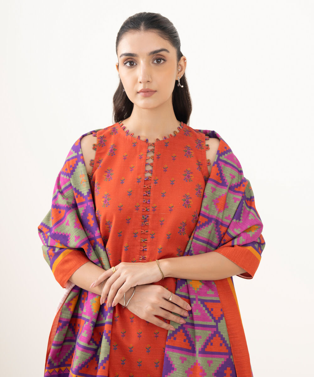 Women's Unstitched Khaddar Printed Orange 3 Piece Suit