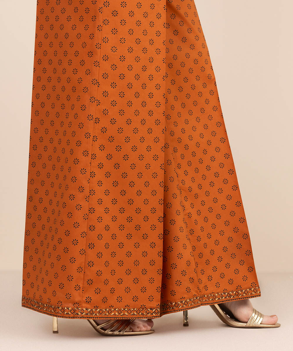 Women's RTW Cambric Orange Printed Flared Pants