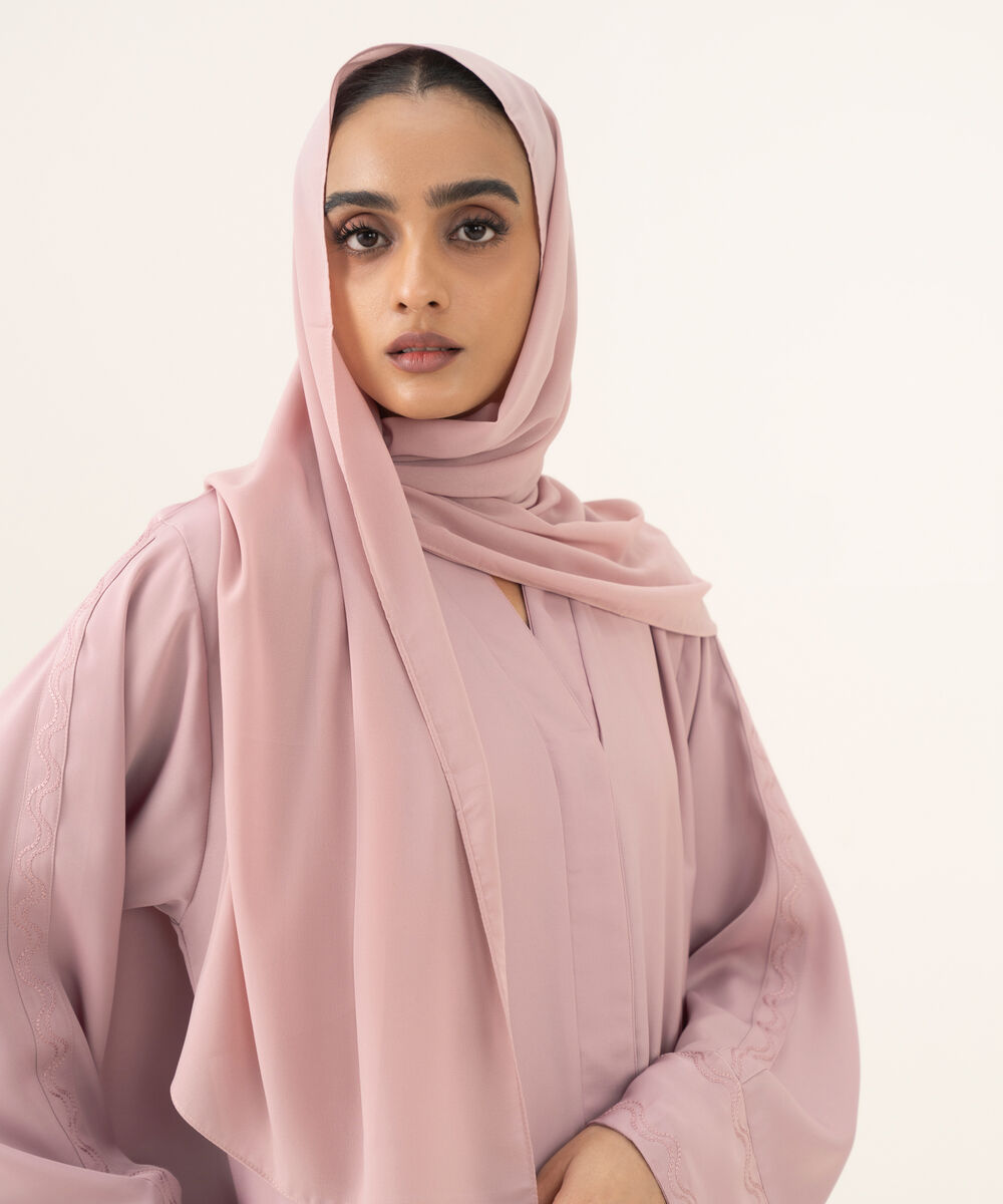 Women's pink button through Abaya with embroidery