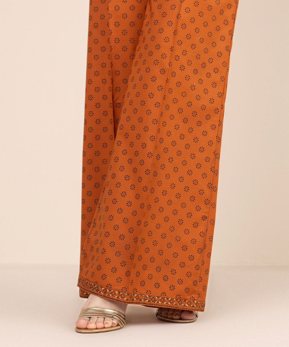 Women's RTW Cambric Orange Printed Flared Pants