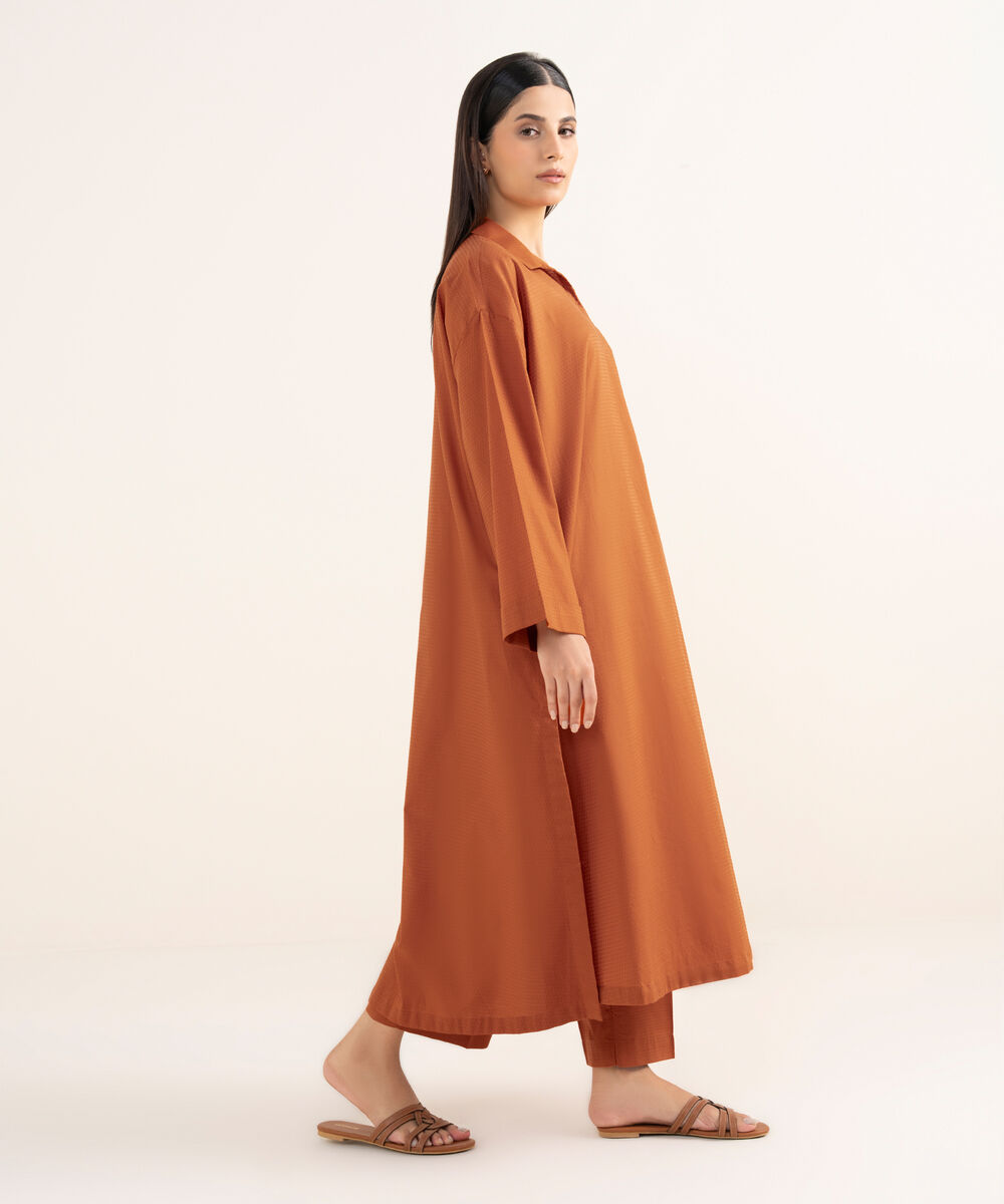 Women's RTW Textured Lawn Orange Solid Drop Shoulder Shirt
