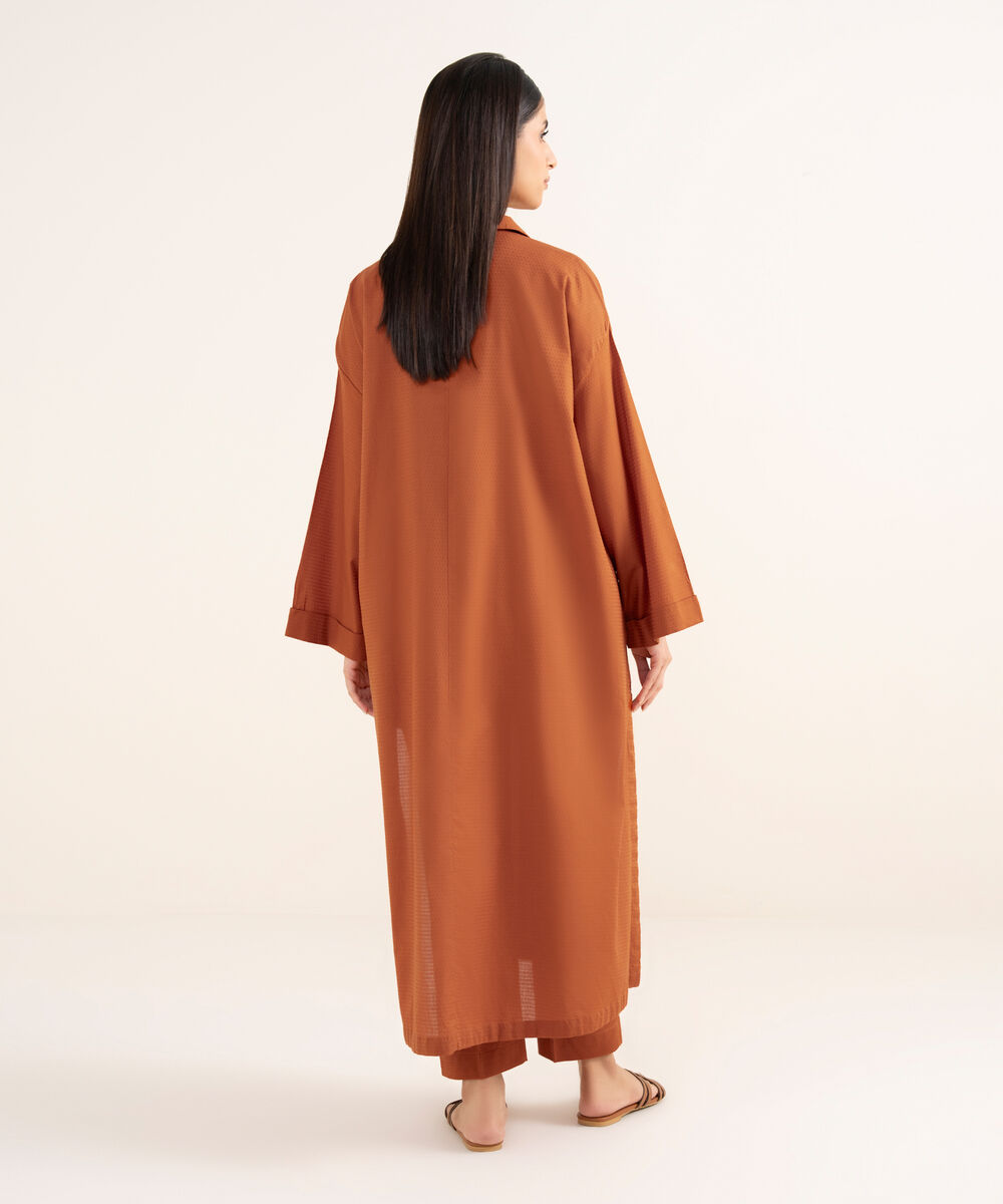 Women's RTW Textured Lawn Orange Solid Drop Shoulder Shirt