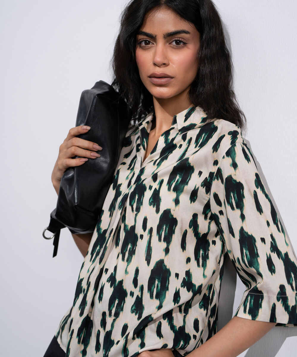 Women's Multi Printed V-Neck Top