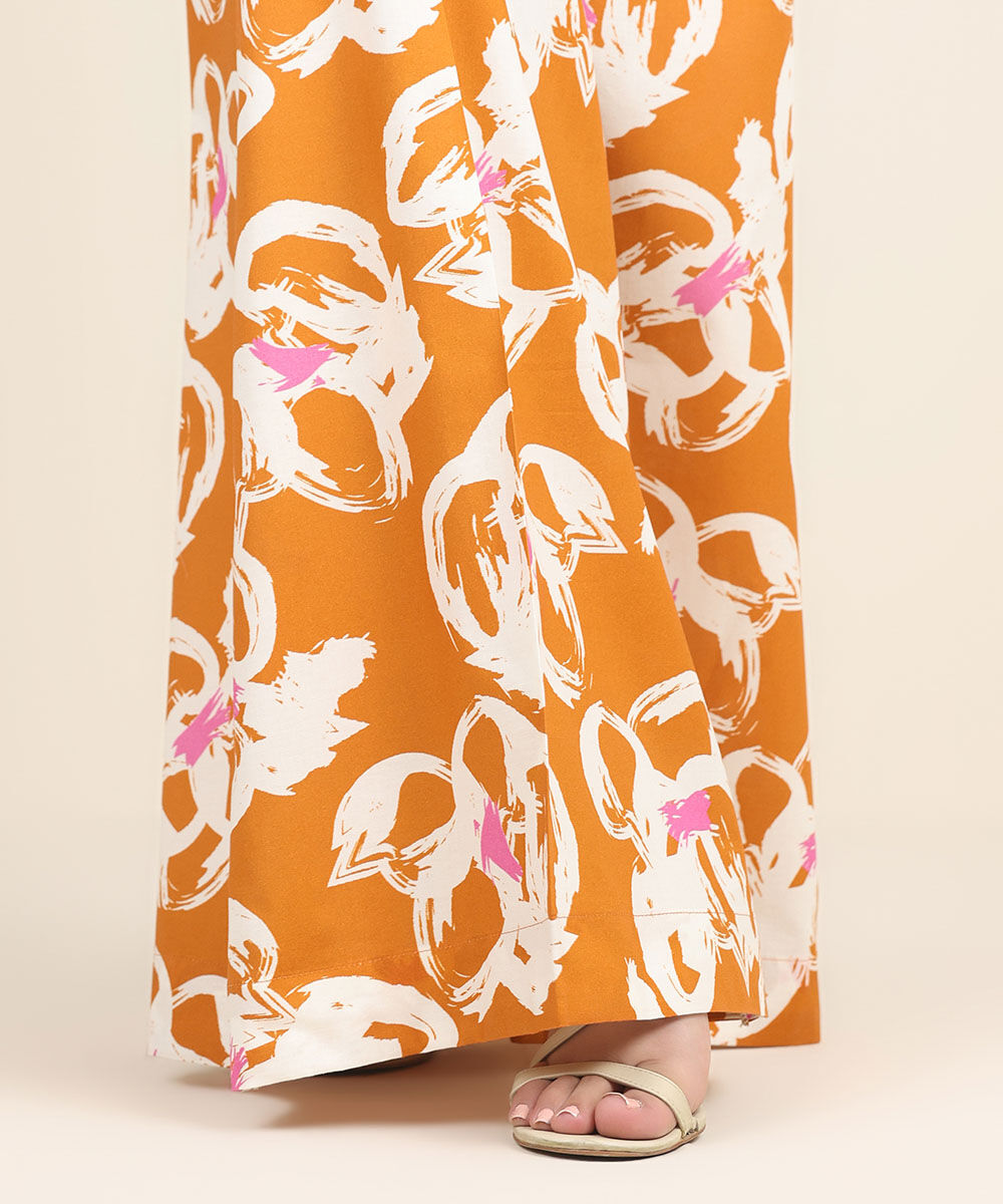 Women's RTW Cambric Orange Printed Flared Pants